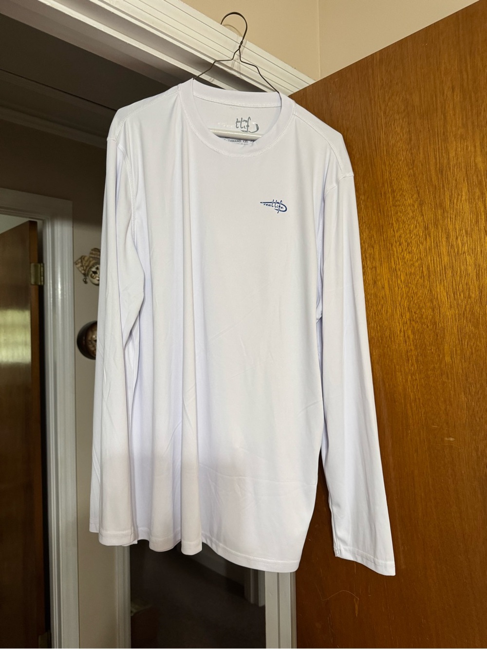 t.g. Sports White Long Sleeve Performance Tee